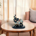 GoHooked black and gold polyresin elephant figurine with intricate royal embellishments, trunk up for good luck.