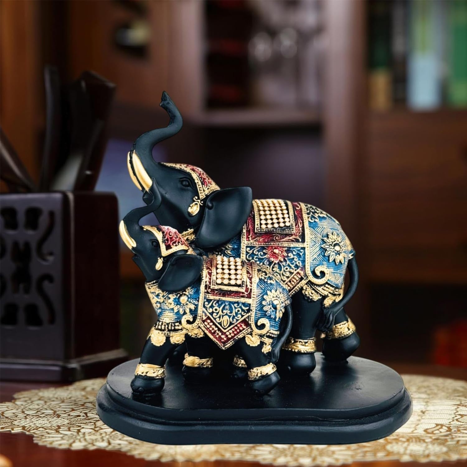 GoHooked black and gold polyresin elephant figurine with intricate royal embellishments, trunk up for good luck.
