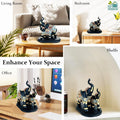 Go Hooked black and gold polyresin elephant figurine with royal embellishments, trunk up for good luck.