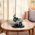 GoHooked black and gold polyresin elephant figurine with ornate royal embellishments, trunk up, symbolizing prosperity.