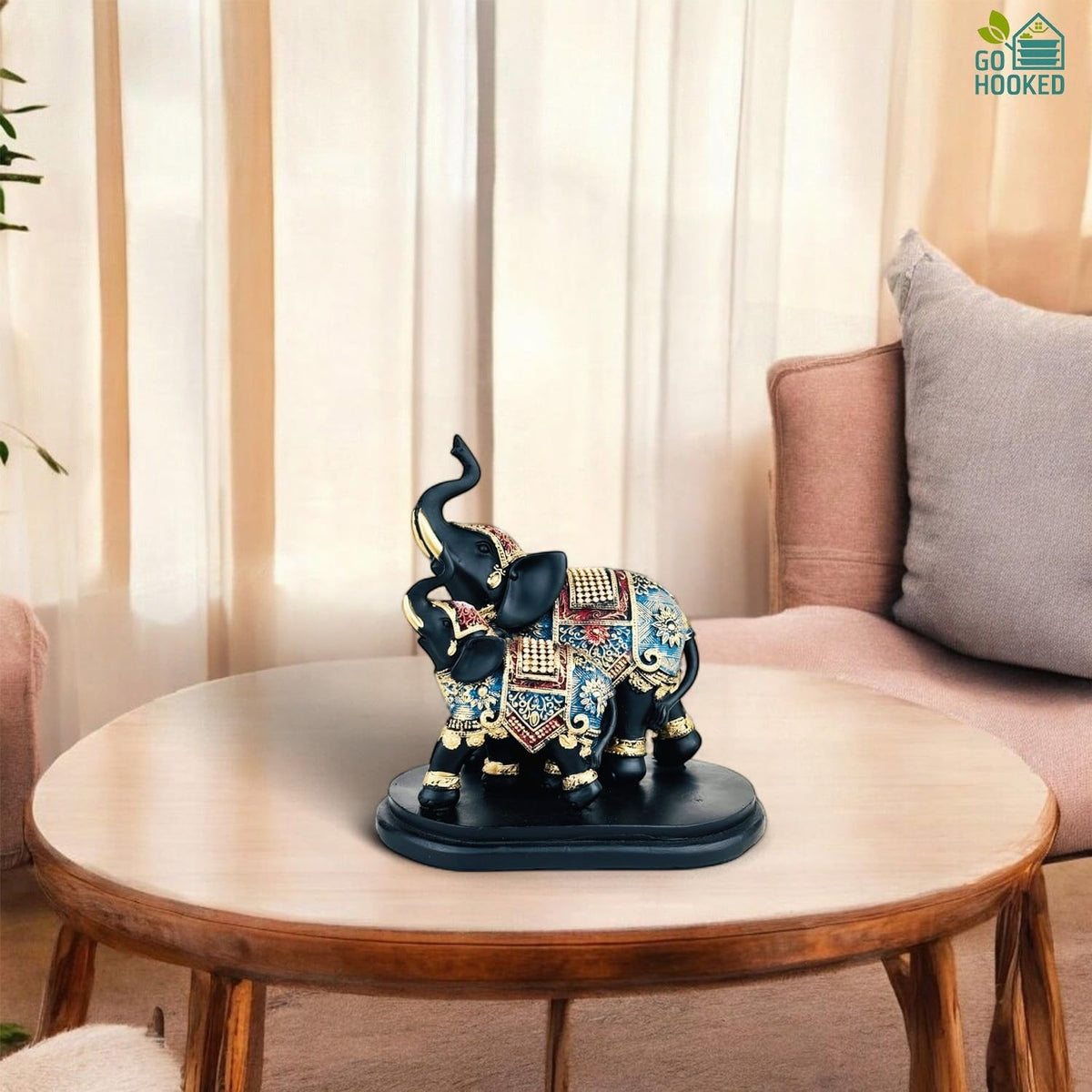 GoHooked black and gold polyresin elephant figurine with ornate royal embellishments, trunk up, symbolizing prosperity.
