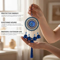 GoHooked blue glass evil eye wind chime with 5 bells and tassel, believed to ward off negativity.
