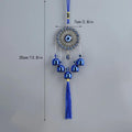 GoHooked blue glass evil eye wind chime with 5 bells and tassel, 35cm long, for home protection and good luck.