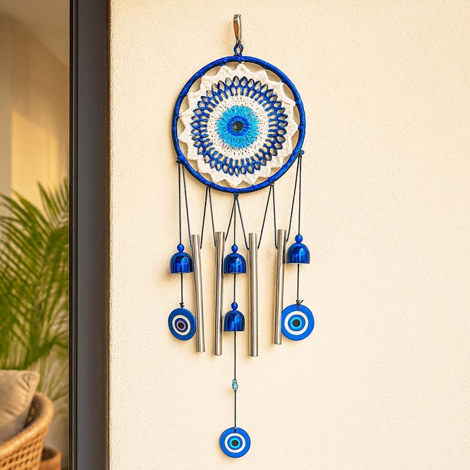 GoHooked blue and white dreamcatcher-style wind chime with silver metal tubes and blue evil eye charms.