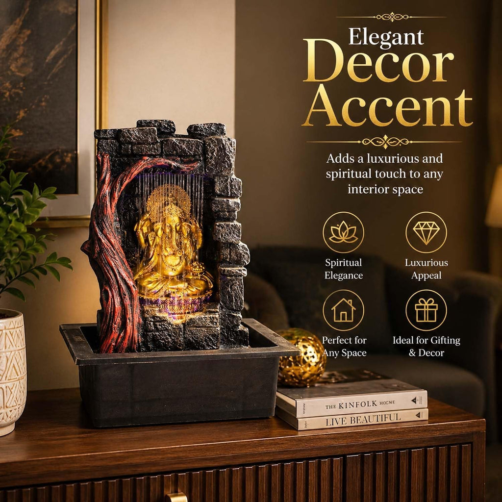 Go Hooked multicolour polyresin Lord Ganesha tabletop water fountain with LED light and pump, featuring a stone texture and tree accent.