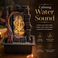 GoHooked multicolour polyresin Lord Ganesha tabletop water fountain with LED light and pump, stone texture finish.