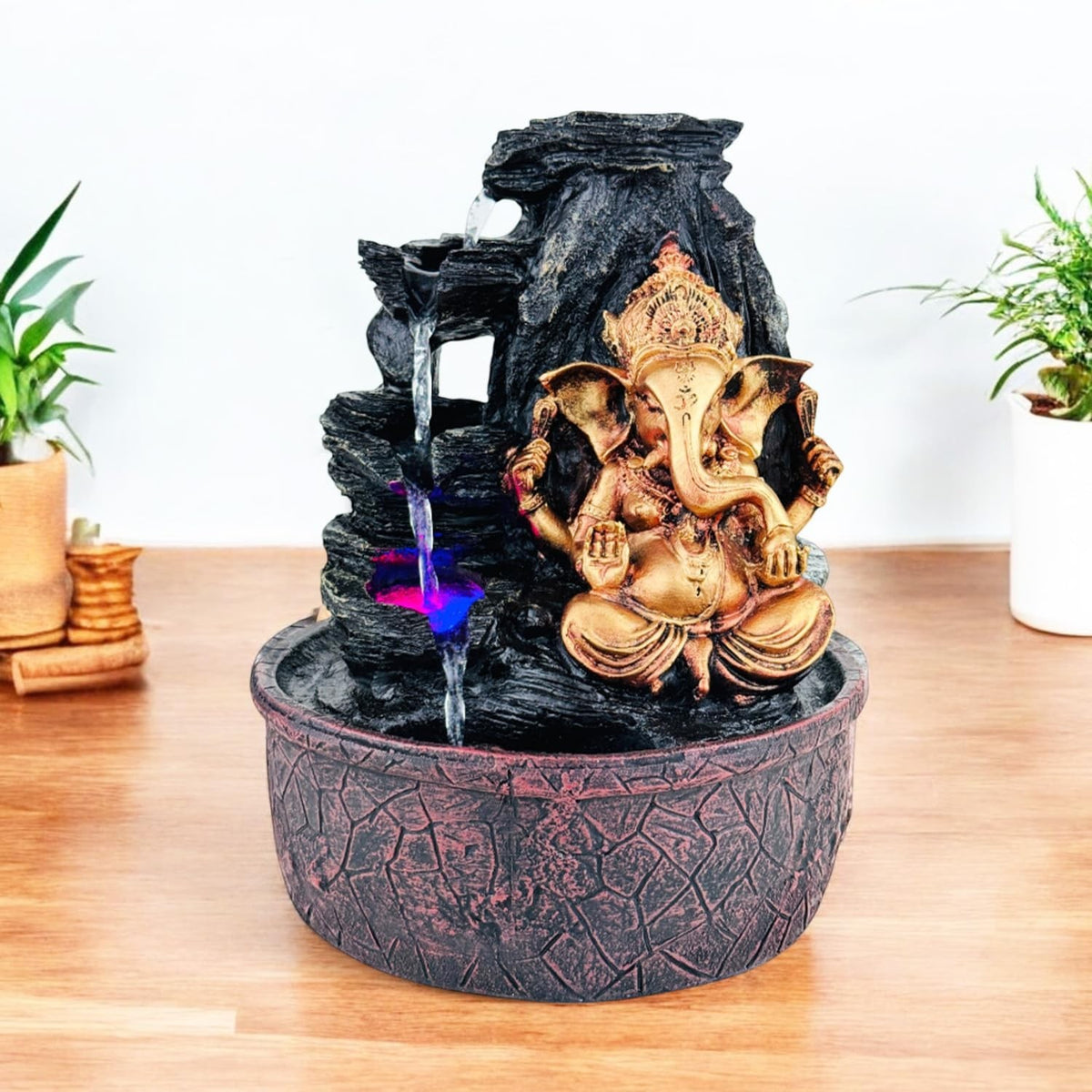 GoHooked Lord Ganesha polyresin tabletop fountain with cascading water and LED lights, ideal for meditation and home decor.
