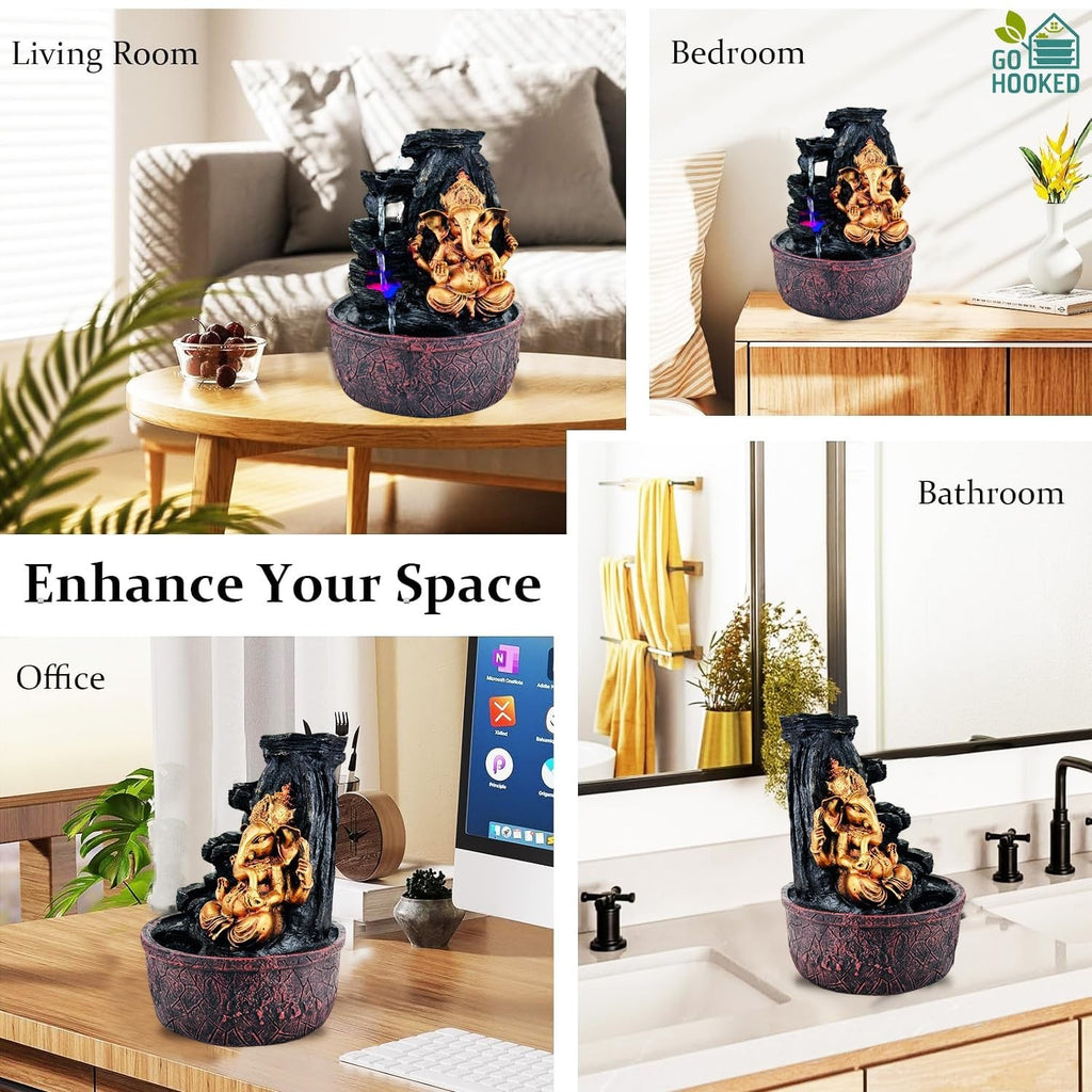 GoHooked Lord Ganesha polyresin tabletop fountain with LED lights and adjustable water flow. Bronze finish.