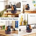 Go Hooked Lord Ganesha polyresin tabletop fountain with LED lights and adjustable water flow. Bronze and dark grey.