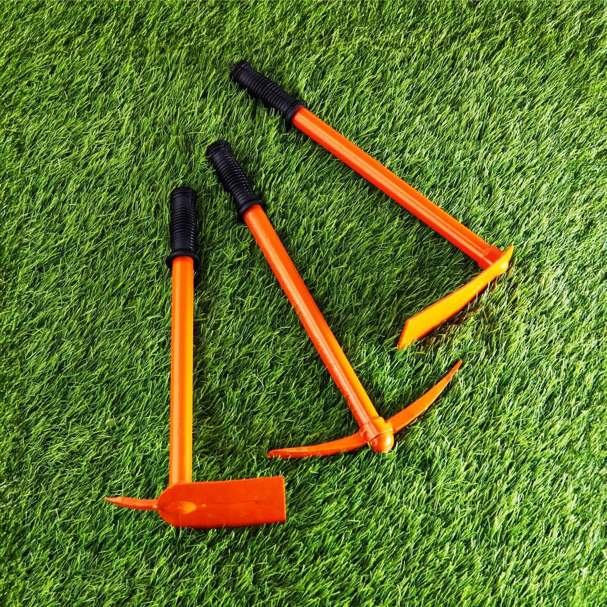 GoHooked heavy duty garden tools set: orange pickaxe, hoe, and pronged hoe on green grass.