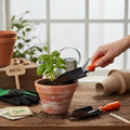 GoHooked gardening tools set with orange handled trowel and transplanter, perfect for potting plants.