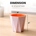 GoHooked 4-inch geometric self-watering plastic plant pot with orange interior. Pack of 5.