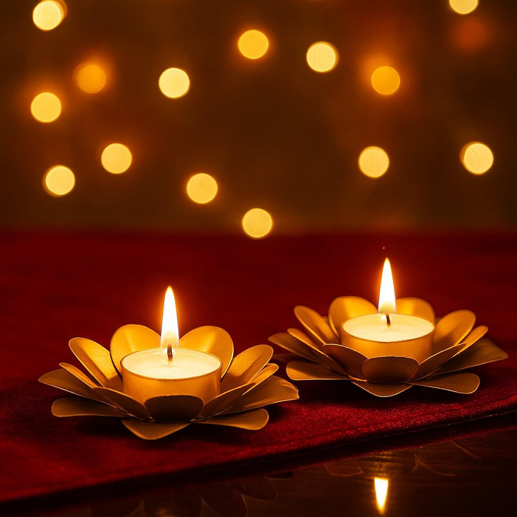 GoHooked Matte gold lotus-shaped metal tealight candle holders with lit candles, set of 2.