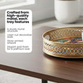 Go Hooked set of 2 round gold metal decorative trays with geometric art and laser-cut rim. Ideal for coffee tables.