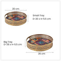 Go Hooked set of 2 round gold metal decorative trays with geometric art and cut-out rims. 8 and 10 inch sizes.