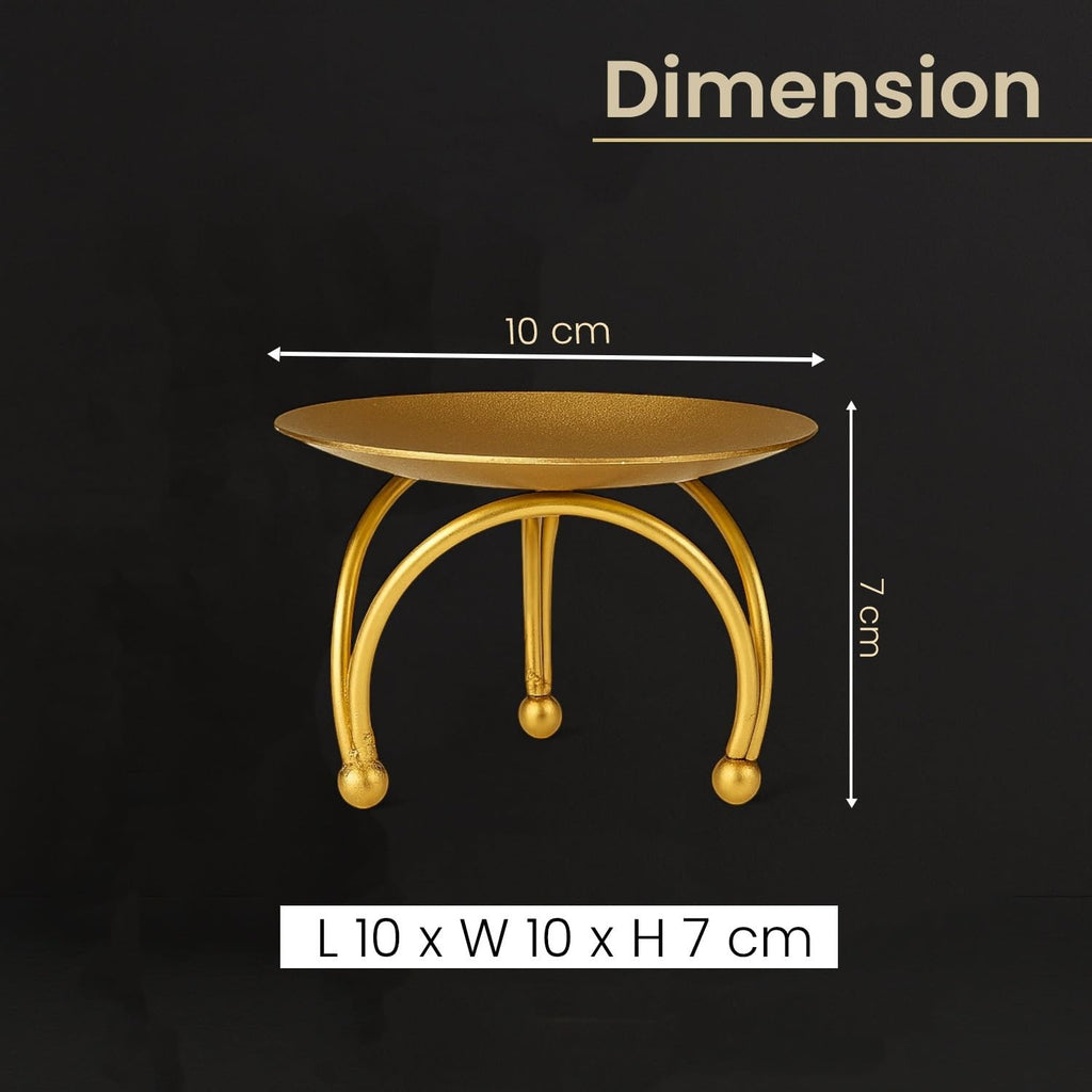 GoHooked Matte gold metal pedestal stand, 10cm wide, 7cm high, with tripod base. Ideal for tealight candles, idols, or desserts.