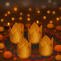 GoHooked set of 2 gold metal crown-shaped tealight holders with leaf cutouts, ideal for festive decor.