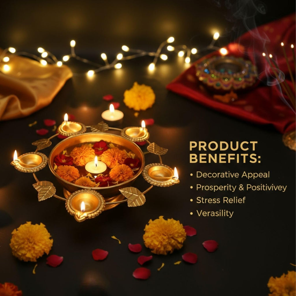 Go Hooked gold metal decorative urli bowl with 5 tealight holders, filled with water, marigolds, and rose petals.