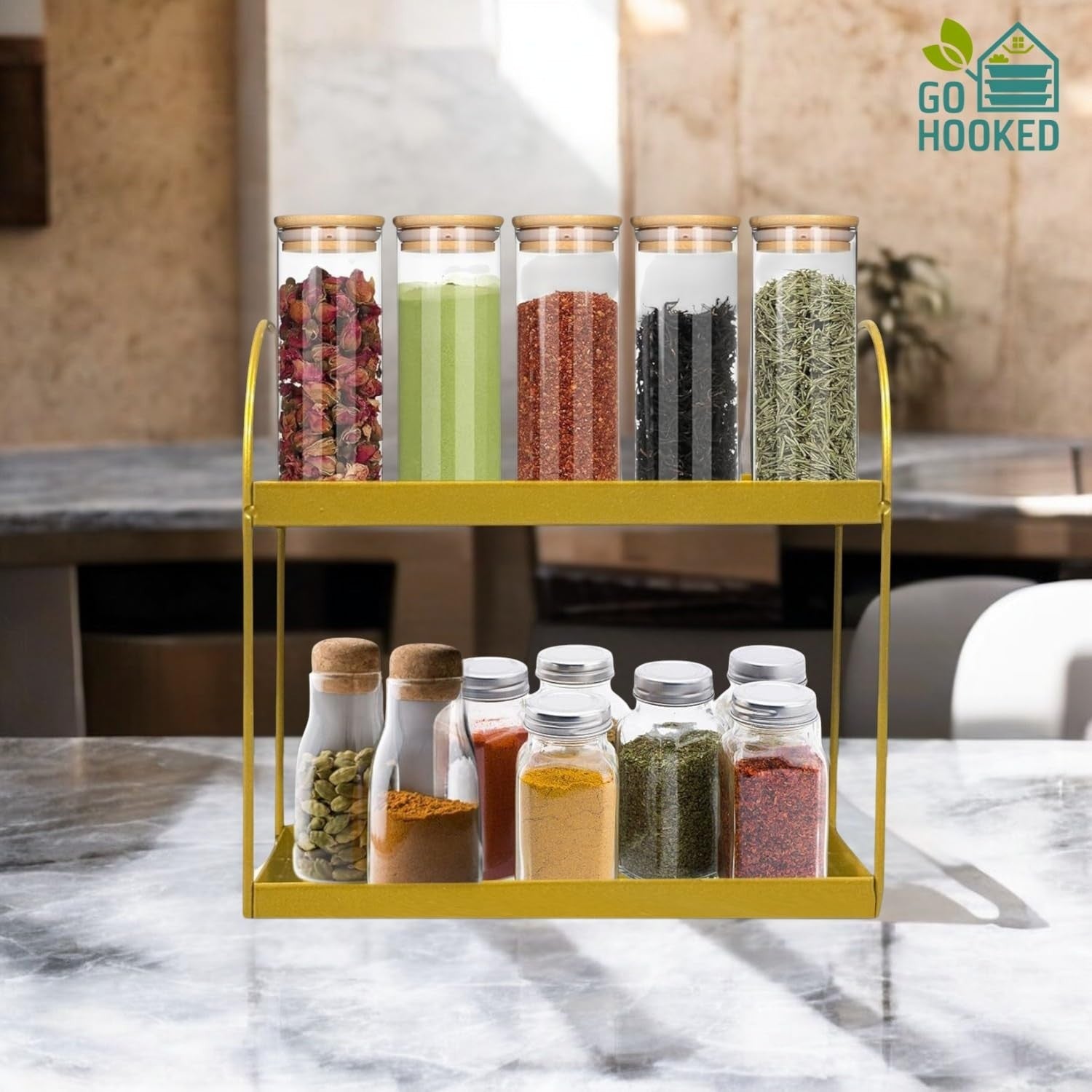 GoHooked golden 2-tier metal standing rack with glass jars of spices and dried herbs.