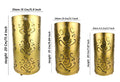 Go Hooked set of 3 golden metal table lamps with intricate Ganesha cutouts. Perfect for home decor.