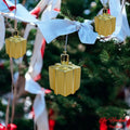 Go Hooked golden gift box Christmas ornaments, 3-inch, pack of 6, festive home decor for trees, walls, and doors.