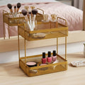 GoHooked golden metal 2-tier standing rack organizer with makeup brushes, perfume bottles, and nail polish.