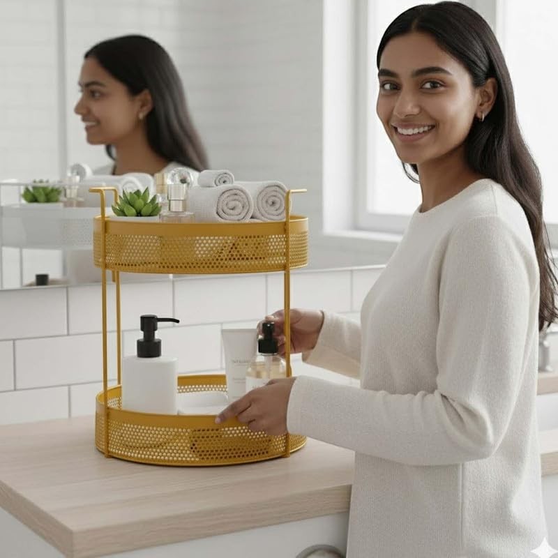 Go Hooked golden metal 2-tier countertop storage basket with mesh design holding toiletries and towels.