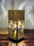 Go Hooked golden metal table lamp with butterfly cutouts and off-white shade, 9.8 inches.
