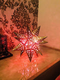 Go Hooked golden metal star-shaped decorative table lamp with cut-out star patterns, 11 inch