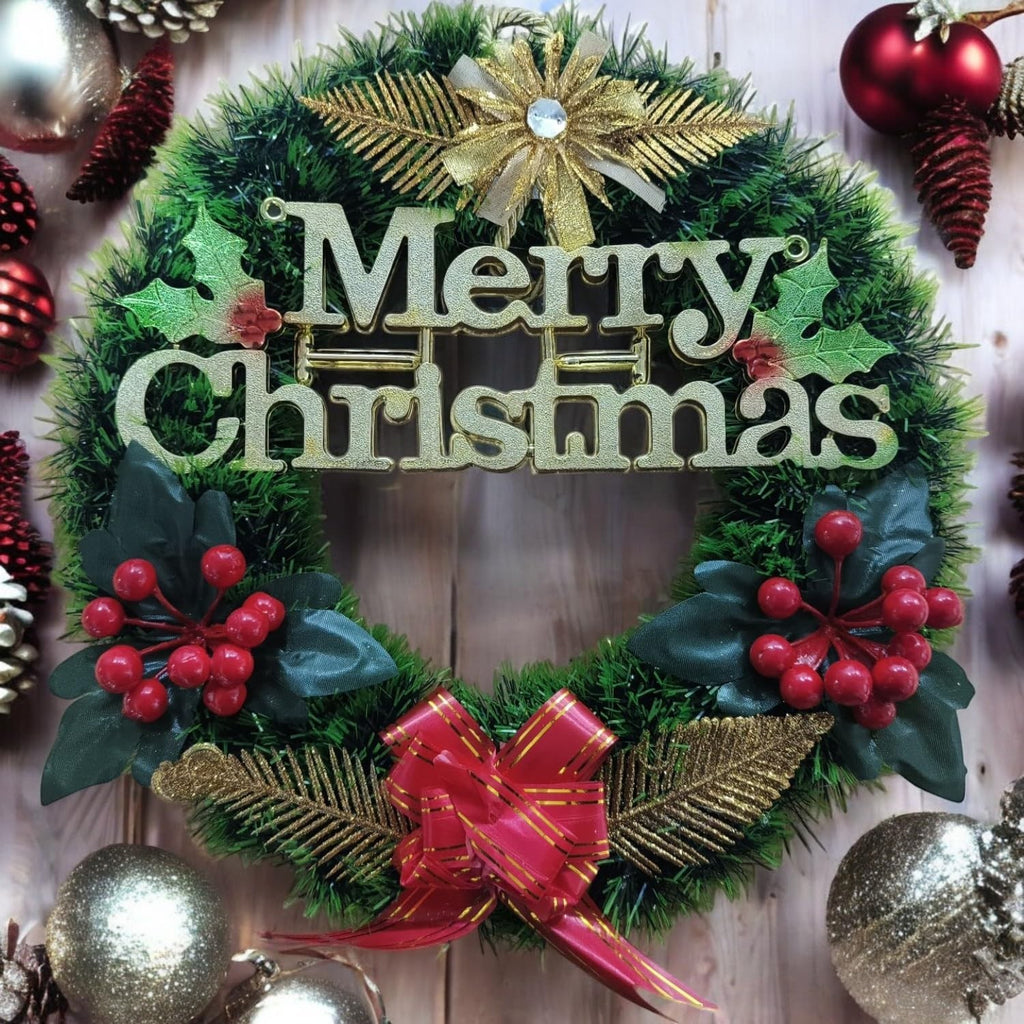 GoHooked green Christmas wreath with "Merry Christmas" text, red berries, gold accents, and a red bow.