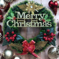 GoHooked green Christmas wreath with "Merry Christmas" text, red berries, gold accents, and a red bow.