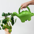 GoHooked green plastic dinosaur watering can for kids, 1 liter capacity, perfect for house plants.
