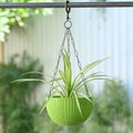 GoHooked green plastic hanging pot with woven texture and chain, 7.1 inch diameter, for indoor/outdoor use.