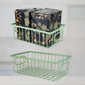 GoHooked green metal wire grid storage basket bin with handles, shown empty and holding wrapped gifts.