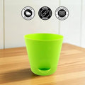 Go Hooked bright green plastic planter pot, durable and weather-resistant, perfect for patios and balconies.