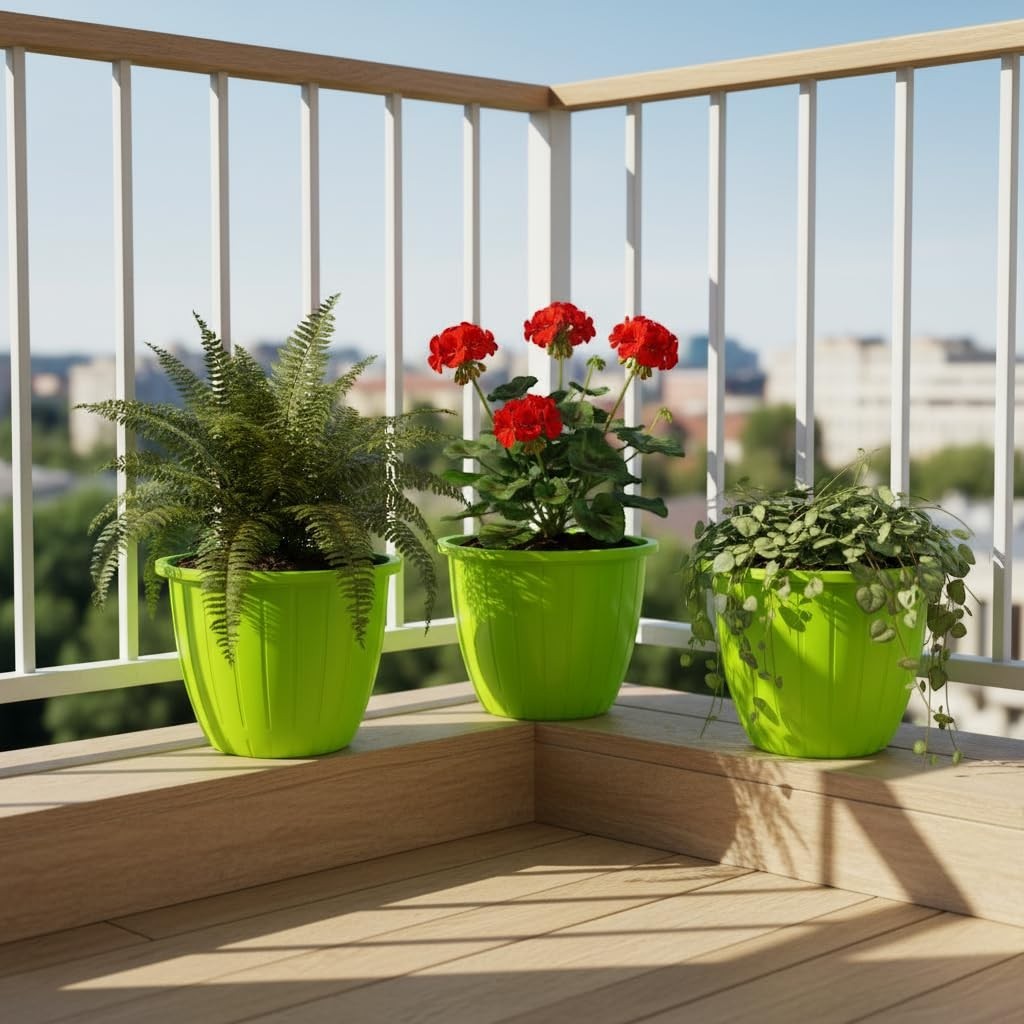 GoHooked set of 3 green plastic planters on a balcony, holding a fern, red geraniums, and a trailing plant.