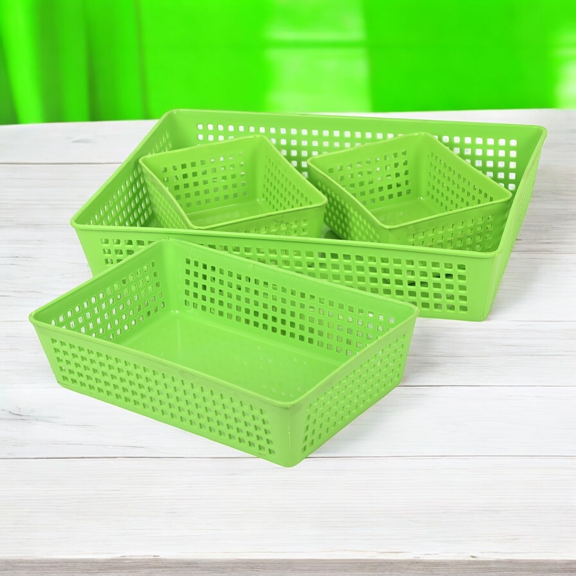 GoHooked 4-piece green plastic tray set with perforated sides for multipurpose storage and organization.