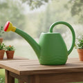 Go Hooked green 1.8L plastic watering can with yellow and red nozzle, ideal for indoor and outdoor gardening.