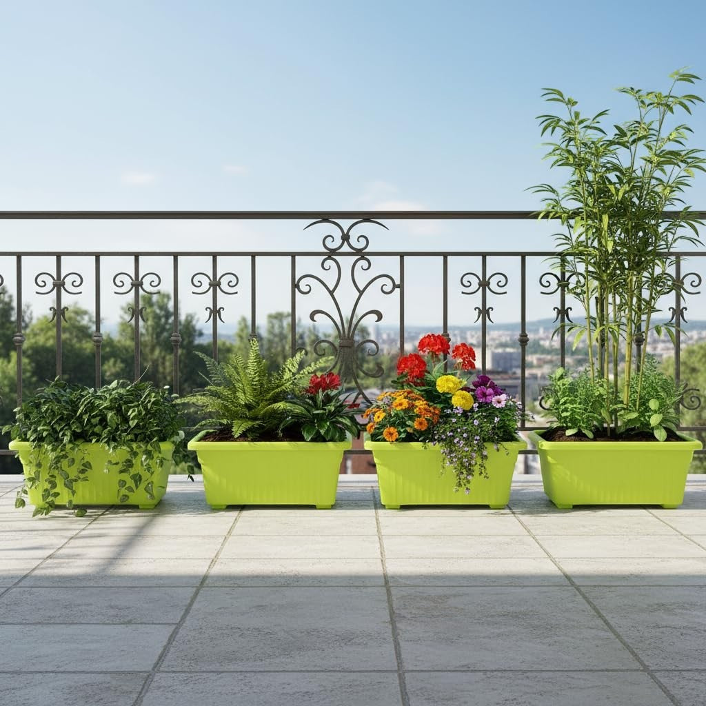Go Hooked set of 4 green rectangular plastic planters with various plants and flowers on a balcony.