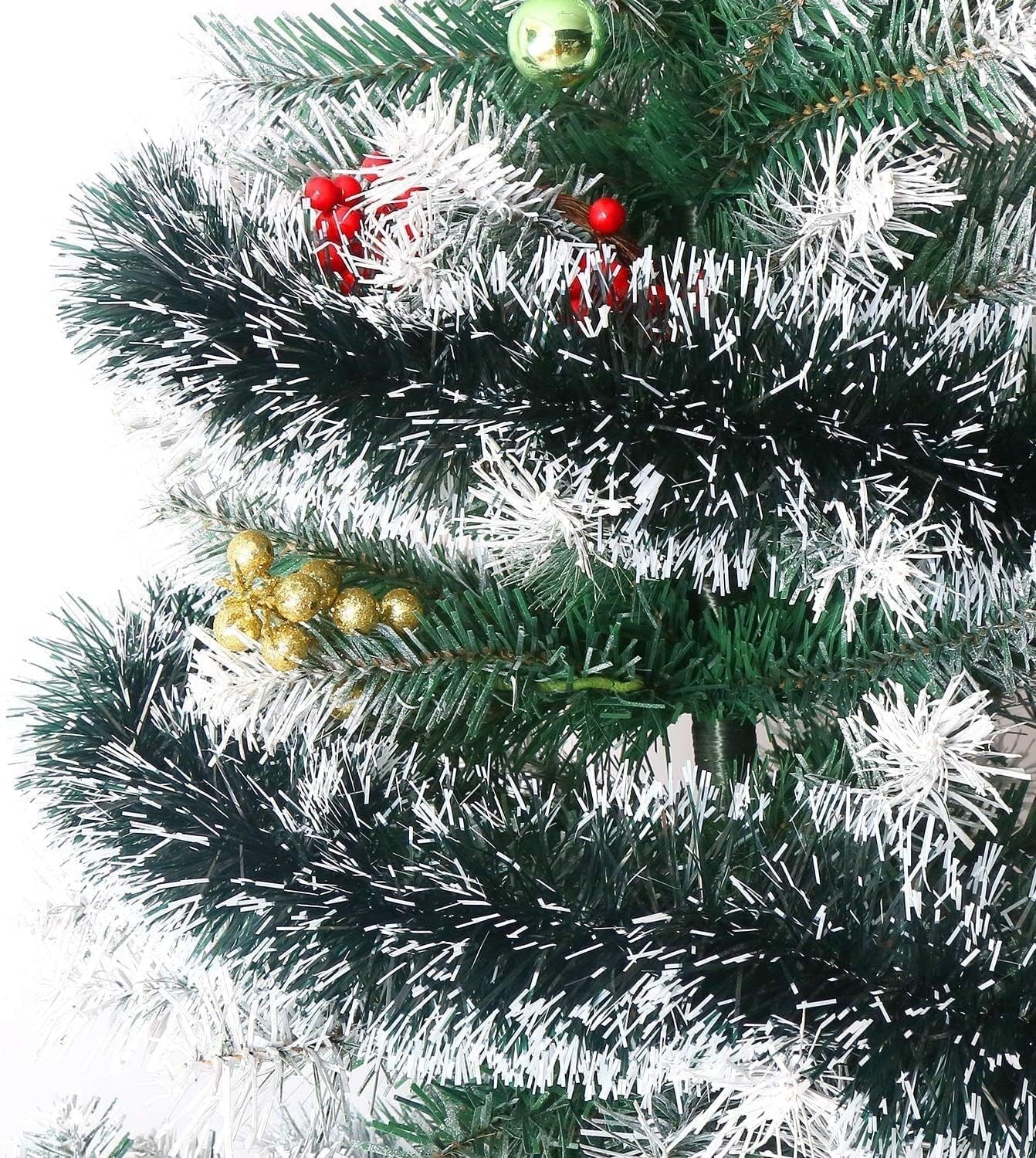 GoHooked green and white tinsel garland with red berries and gold baubles on a Christmas tree.