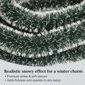GoHooked green and white tinsel garland with a realistic snowy effect, perfect for Christmas decor.