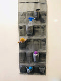 GoHooked grey non-woven fabric 20-pocket door organizer with clear pockets holding various items like spray bottle, toys, and bottles.