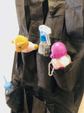 GoHooked grey non-woven fabric 20-pocket door organizer holding a teddy bear, spray bottle, and water bottle.