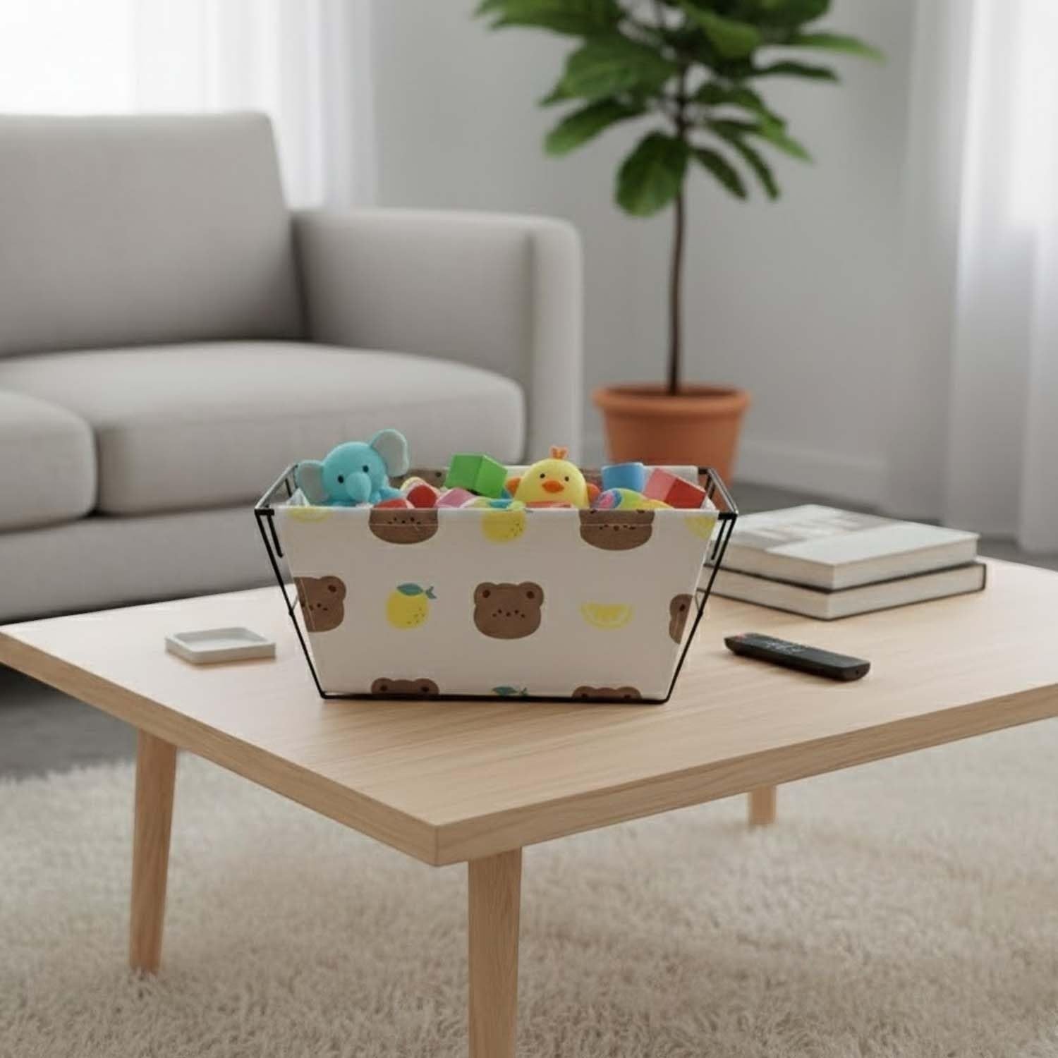 GoHooked grey metal wire storage basket with cute bear face design and detachable fabric liner, filled with kids toys.
