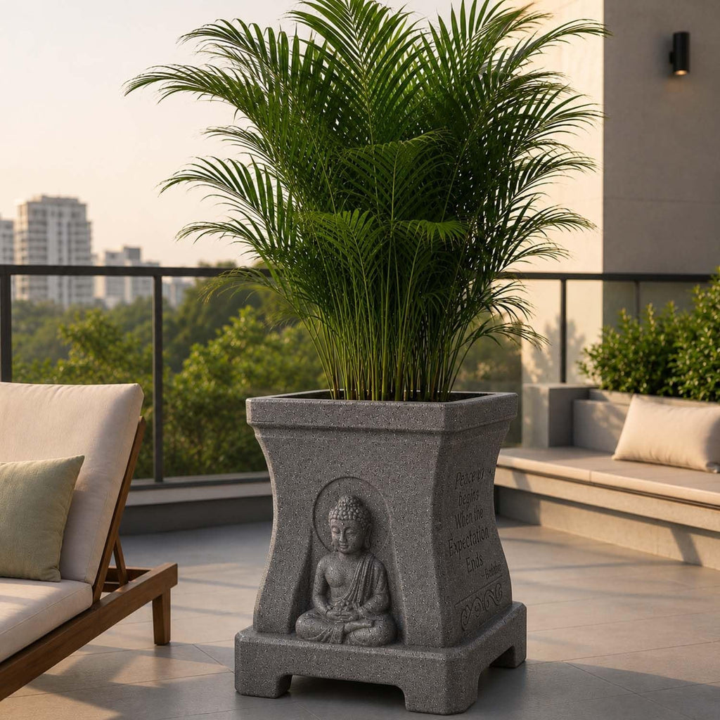 GoHooked grey square polymer Buddha planter with stone-look texture and engraved quotes on a modern balcony.