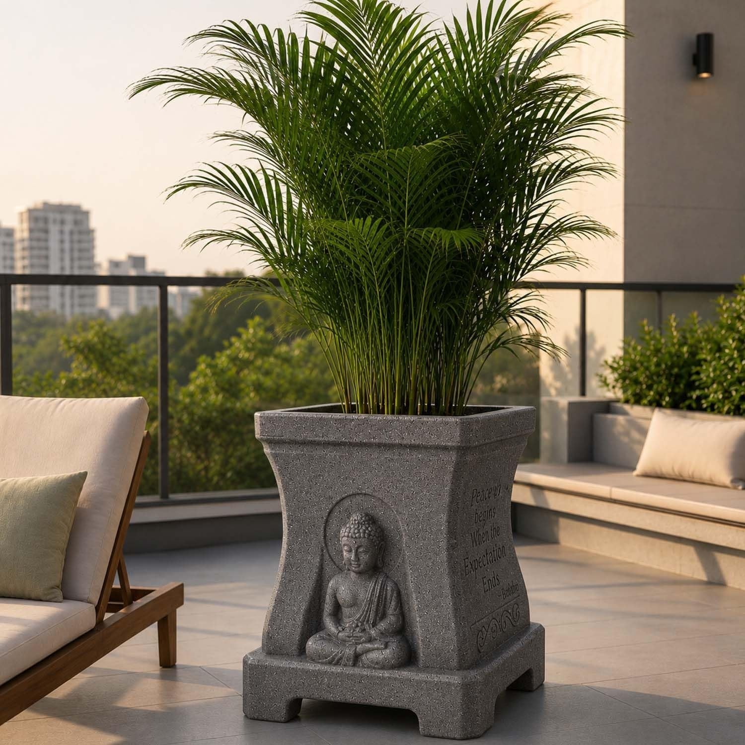GoHooked grey square polymer Buddha planter with stone-look texture and engraved quotes on a modern balcony.