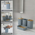Go Hooked grey plastic 4-piece bathroom set with heart embossed design, includes soap dispenser, tumbler, toothbrush holder, and soap dish.