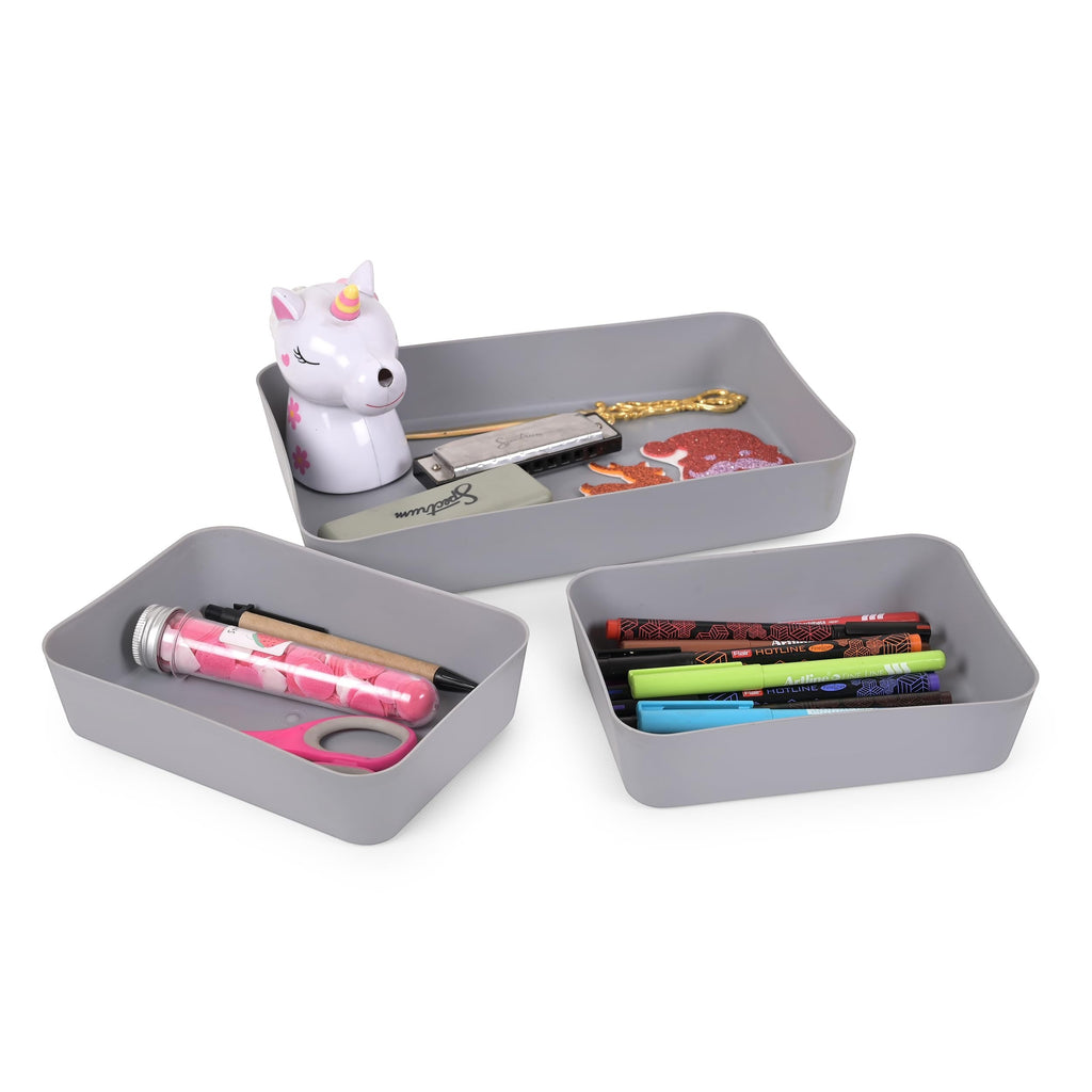 GoHooked set of 3 grey plastic storage trays with pens, scissors, harmonica, and unicorn toy.