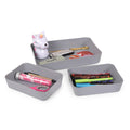 GoHooked set of 3 grey plastic storage trays with pens, scissors, harmonica, and unicorn toy.