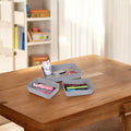GoHooked set of 3 grey plastic storage trays holding pens, scissors, and office supplies on a wooden table.